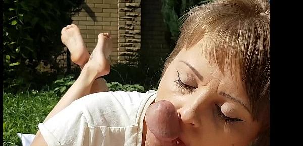  Pretty milf sucks him off with showing her little sexy soles in the yard
